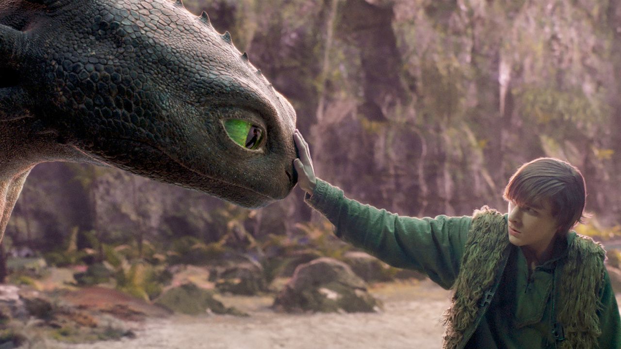 Mason Thames (right) as Hiccup with his Night Fury dragon, Toothless, in Universal Pictures’ live-action 'How to Train Your Dragon', written and directed by Dean DeBlois. Photo: Universal Pictures.